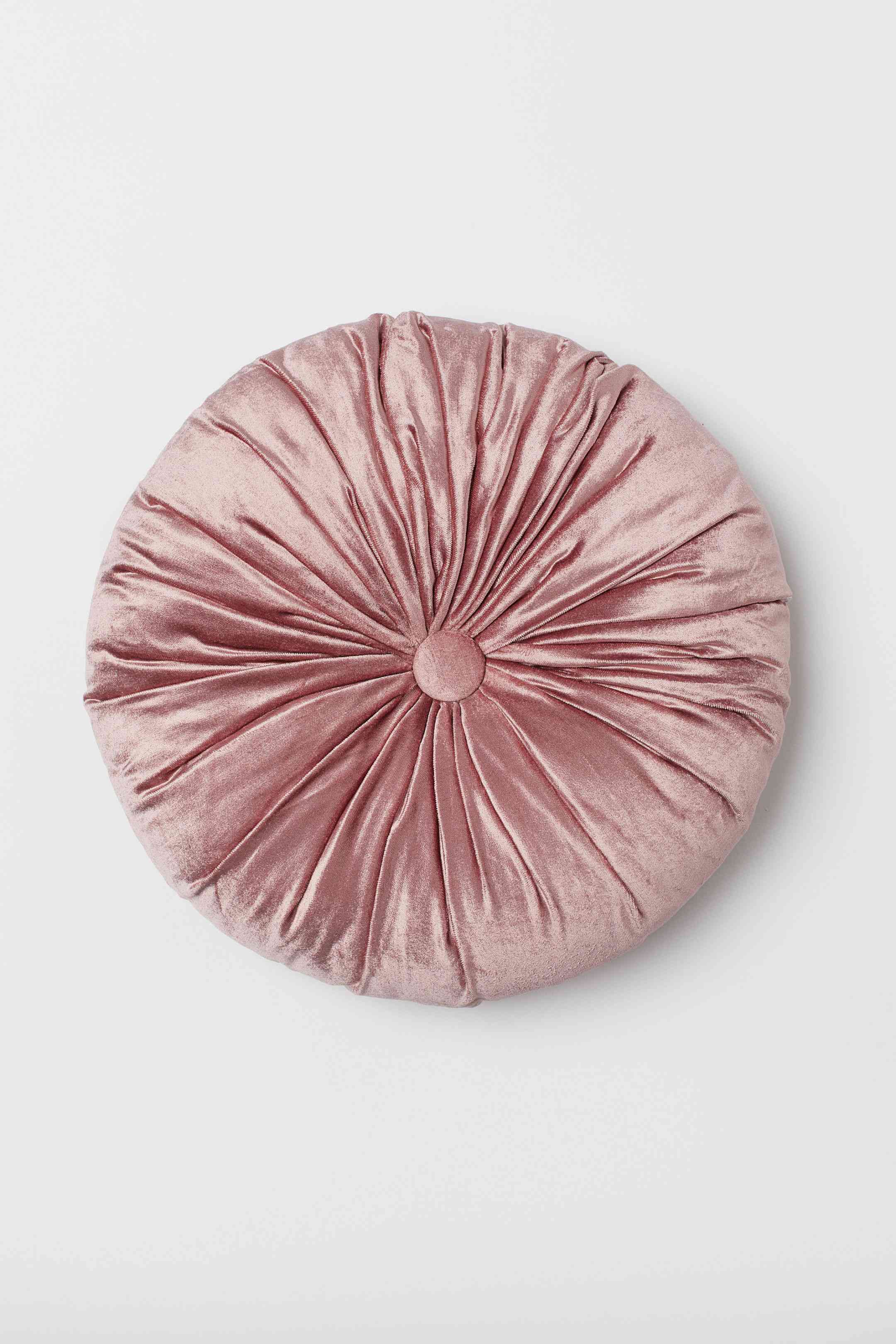 圆形粉红丝绒坐垫