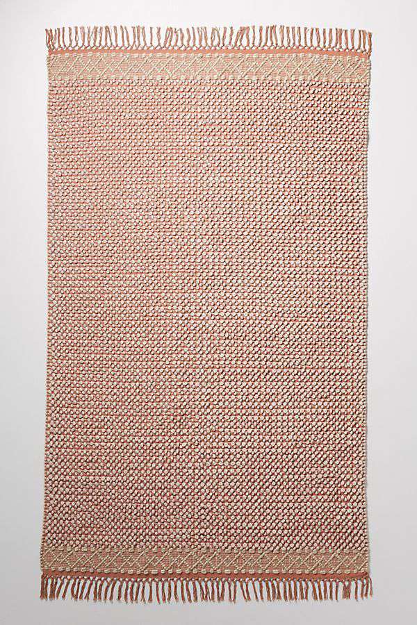 人类学教授乔安娜·盖恩斯为人类学教授伊娃·鲁瓦设计了一个富有质感的小客厅