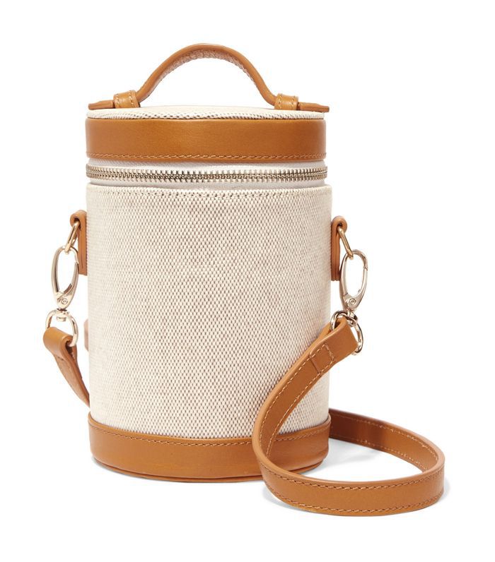 斜挎胶囊真皮包裹的帆布单肩包