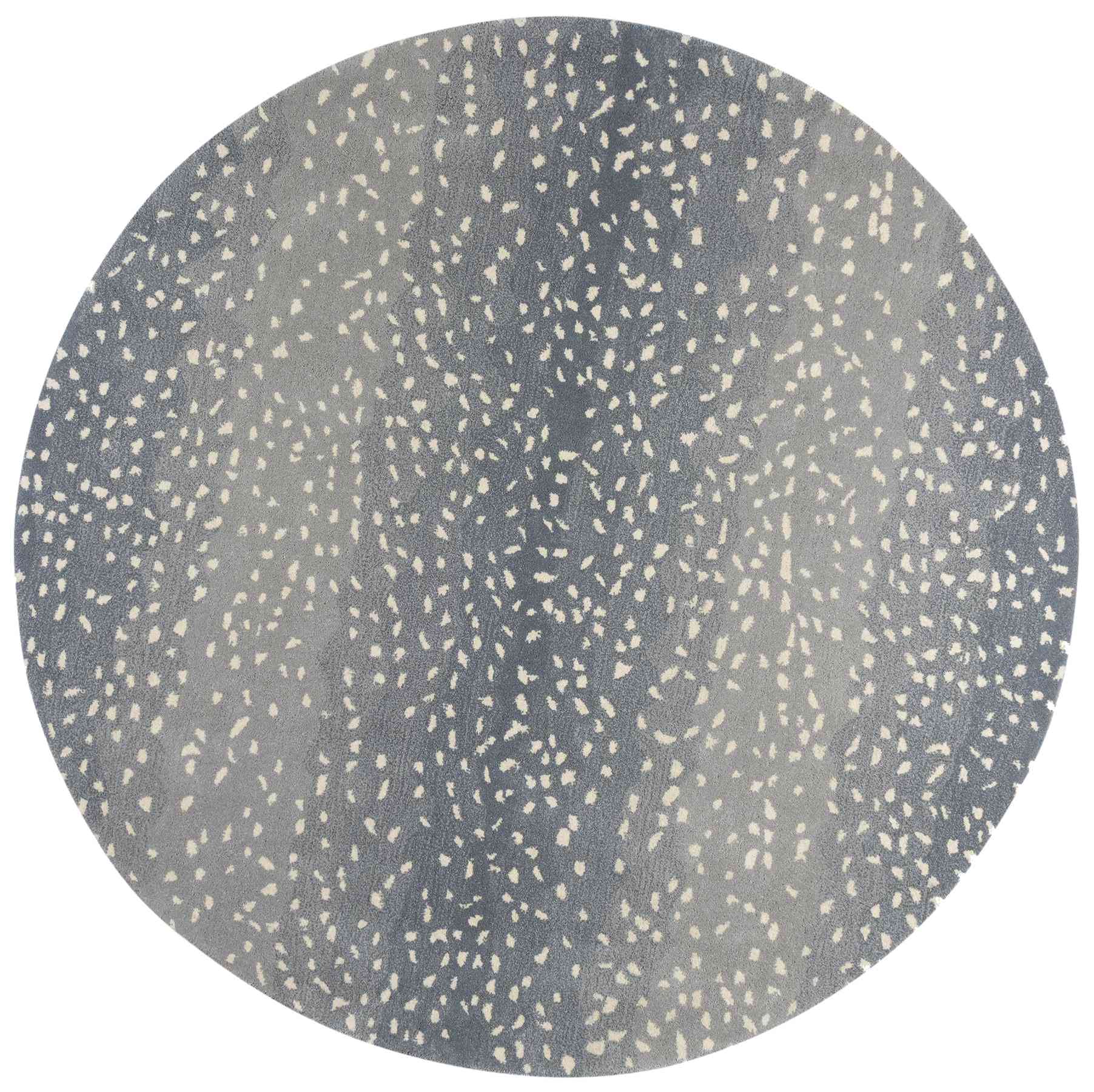 带有蓝色羚羊图案的圆形羊毛地毯。