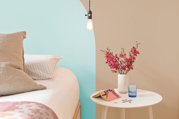 Bedroom with teracotta and blue paint