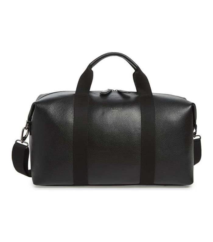 拿着皮旅行包 - 黑