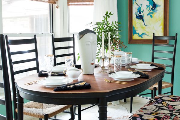 Modern gold chandelier in dining room