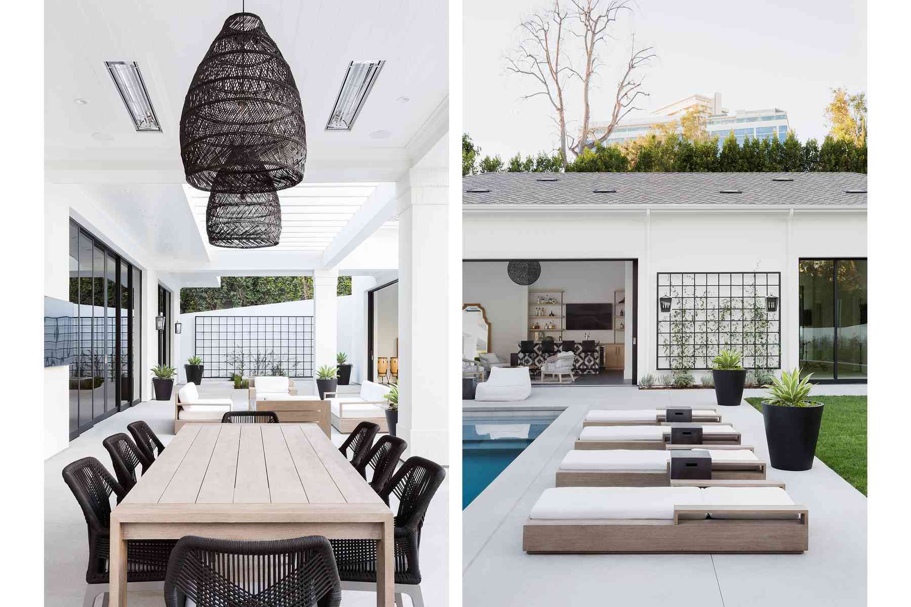 与餐桌和金属墙壁艺术的室外空间。