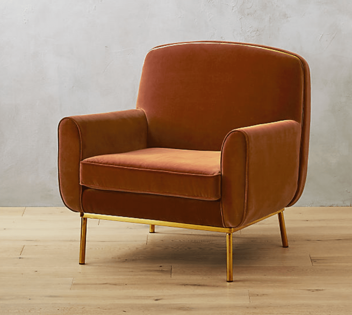 晕橙色丝绒扶手椅